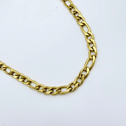 gold figaro link chain necklace with polished interlocking links