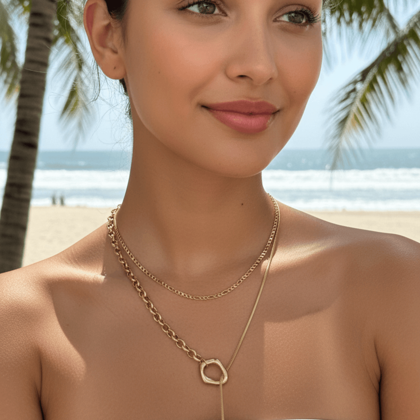 gold figaro link chain necklace with polished interlocking links