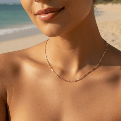 gold figaro link chain necklace with polished interlocking links