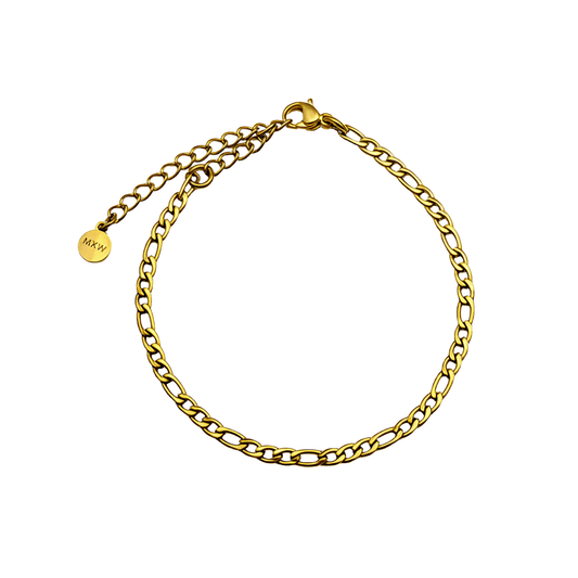 Gold Figaro link chain bracelet with polished elongated and short links.