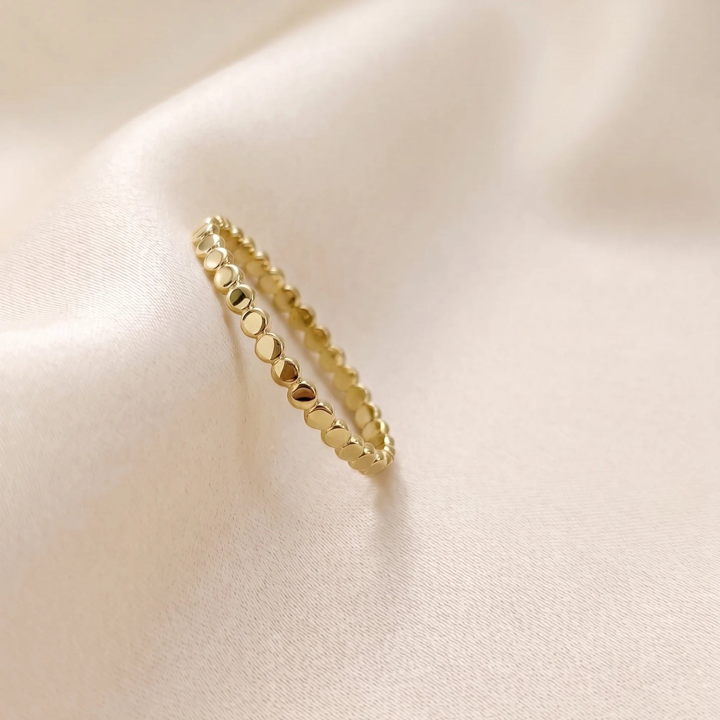 Dainty 14K gold filled stacking ring with small light-catching disc details