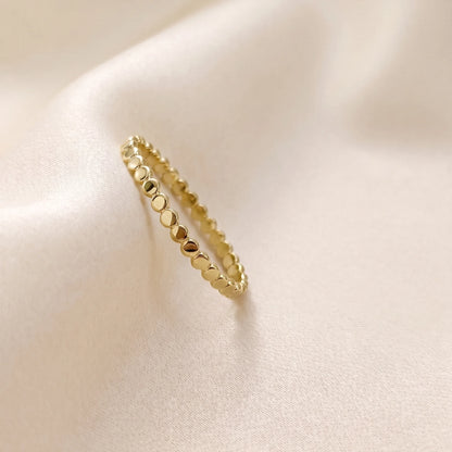 Dainty 14K gold filled stacking ring with small light-catching disc details