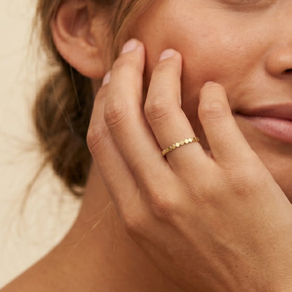 Dainty 14K gold filled stacking ring with small light-catching disc details