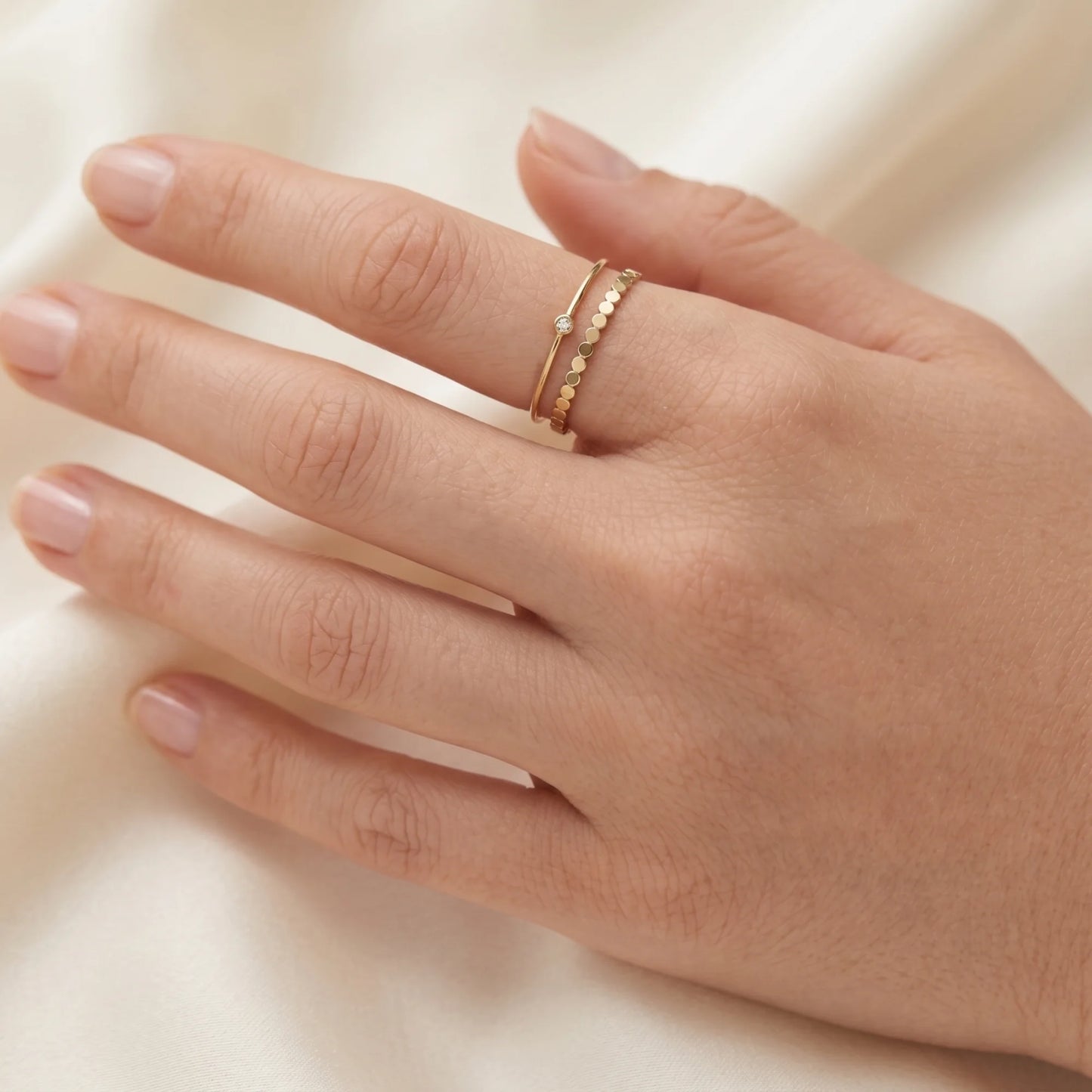Dainty 14K gold filled stacking ring with small light-catching disc details