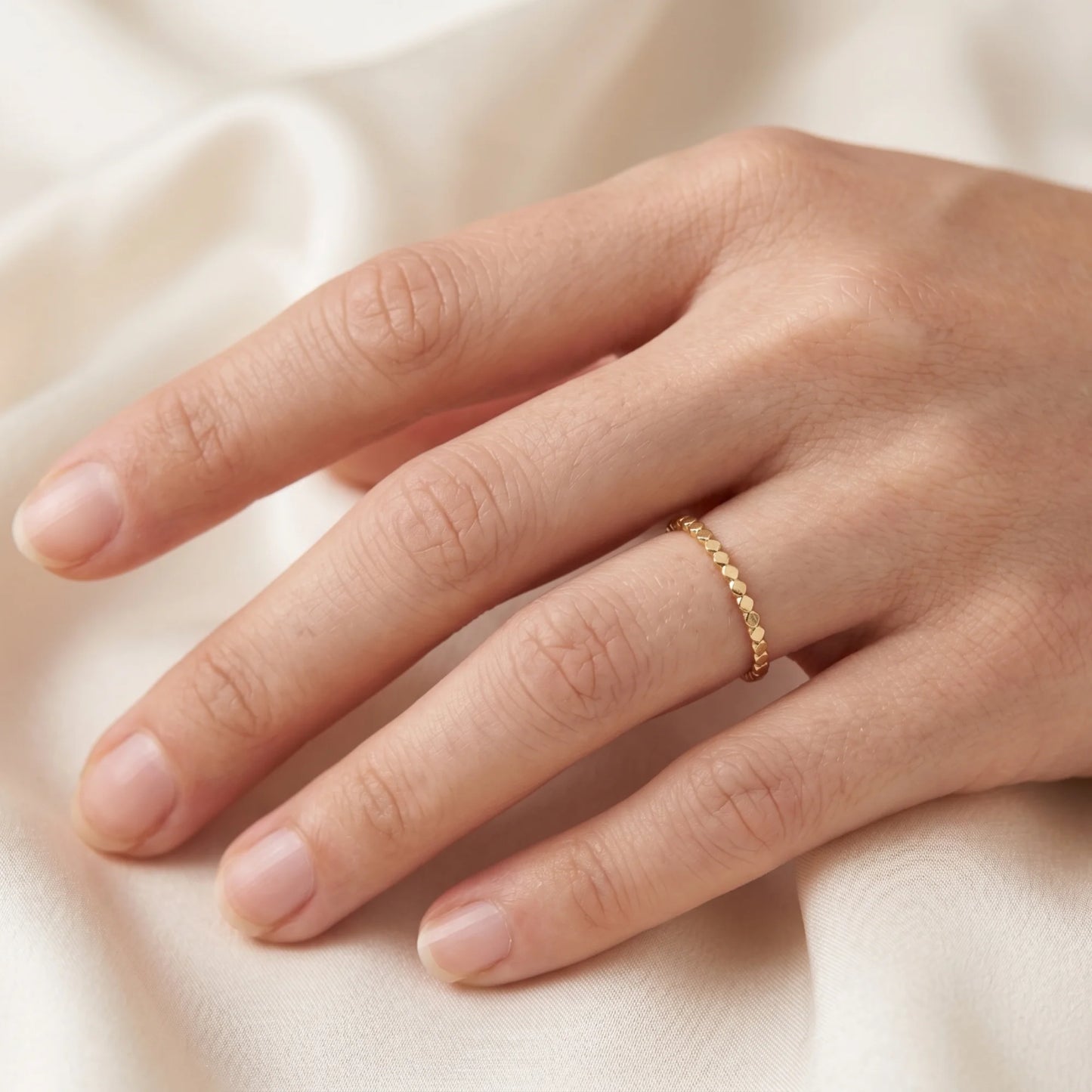 Dainty 14K gold filled stacking ring with small light-catching disc details