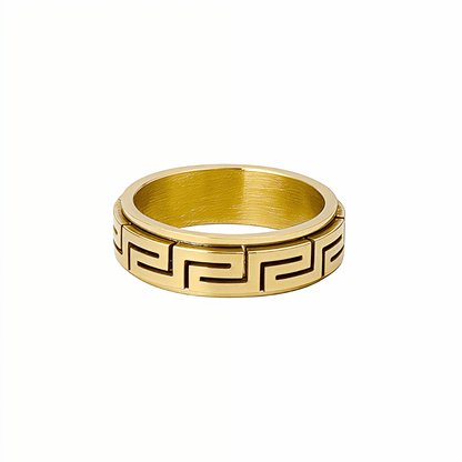 Gold Greek Key Spinner Ring by MXW Jewellery, featuring a rotating band with meander pattern for anxiety relief.