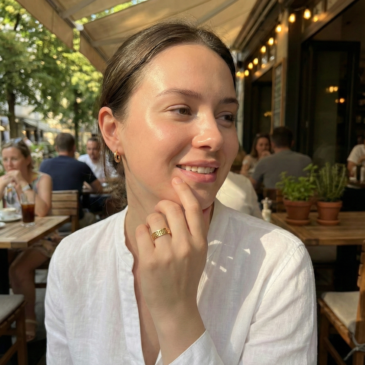 Gold Greek Key Spinner Ring by MXW Jewellery, featuring a rotating band with meander pattern for anxiety relief.
