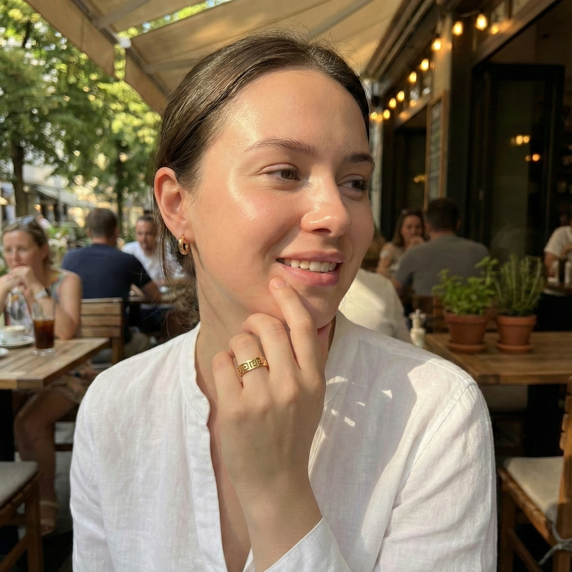 Gold Greek Key Spinner Ring by MXW Jewellery, featuring a rotating band with meander pattern for anxiety relief.