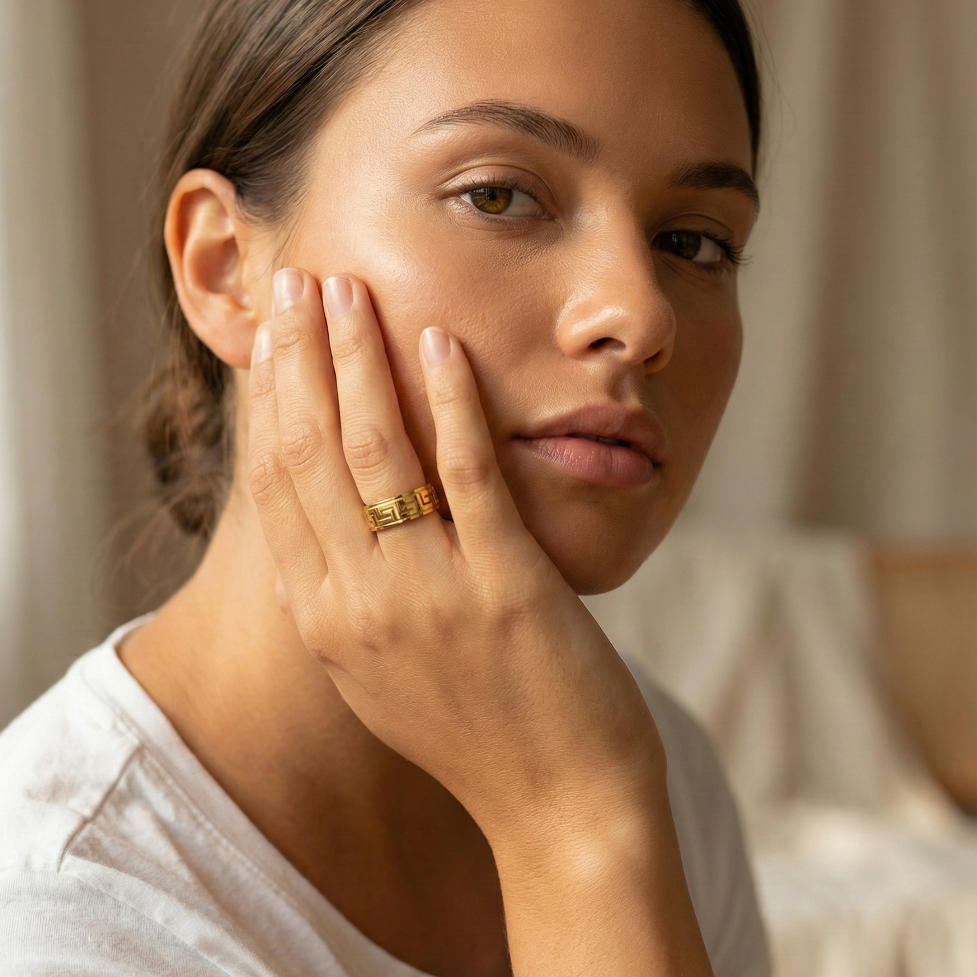 Gold Greek Key Spinner Ring by MXW Jewellery, featuring a rotating band with meander pattern for anxiety relief.