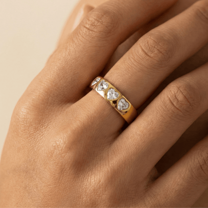 Gold Heart Eternity Ring with flush-set heart zircons on a thick gold band by MXW Jewellery