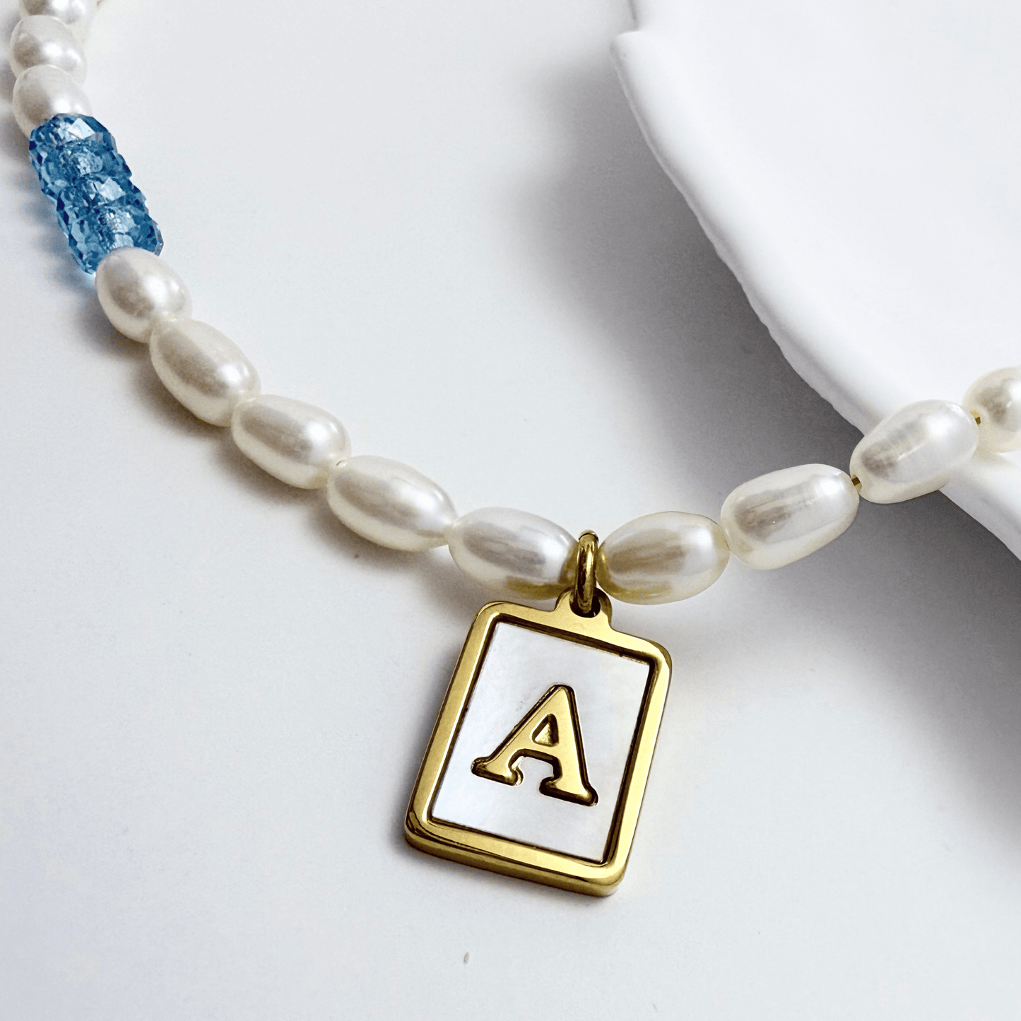 gold initial and birthstone pearl necklace featuring freshwater pearl and Swarovski element crystal, personalised elegant jewellery gift for women