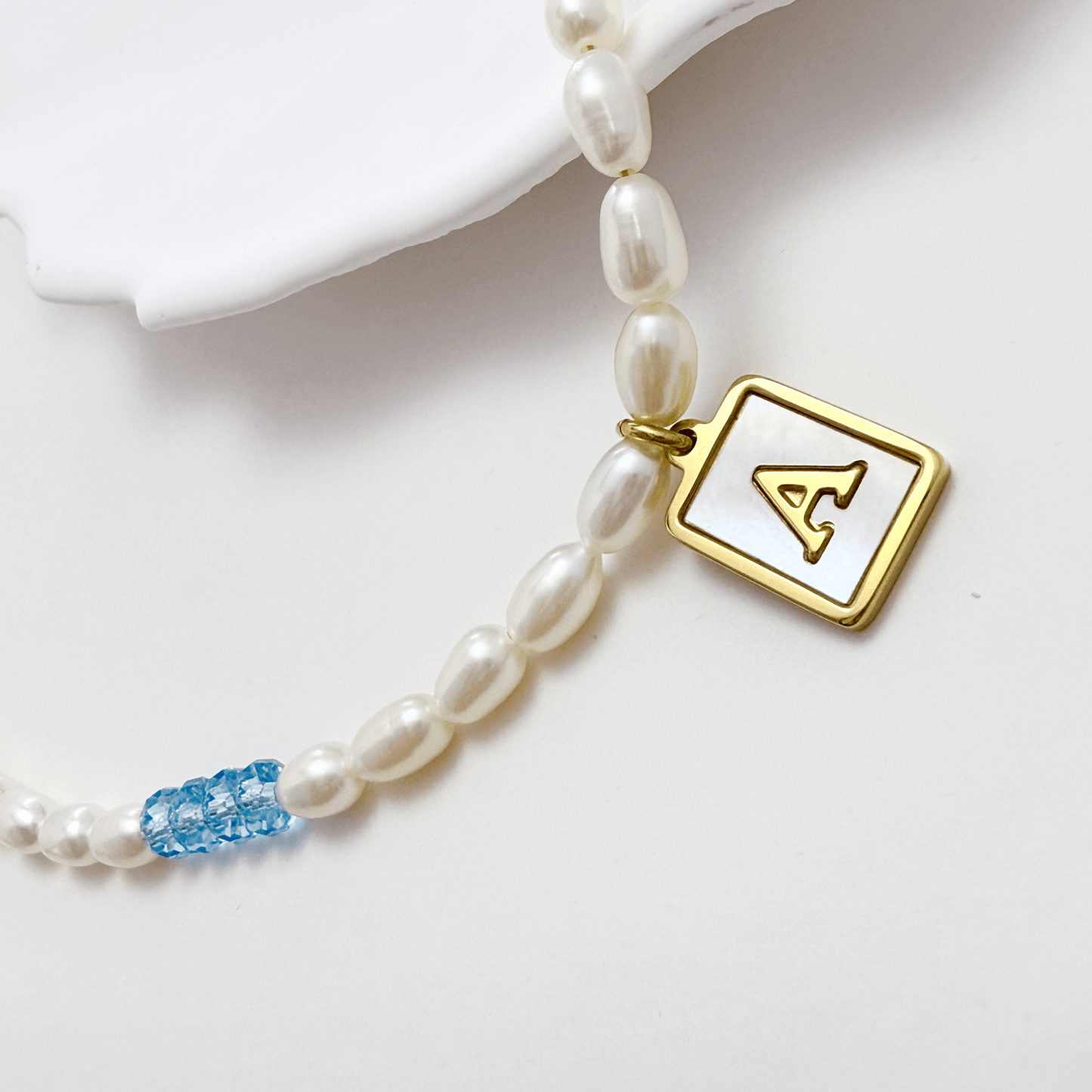 gold initial and birthstone pearl necklace featuring freshwater pearl and Swarovski element crystal, personalised elegant jewellery gift for women