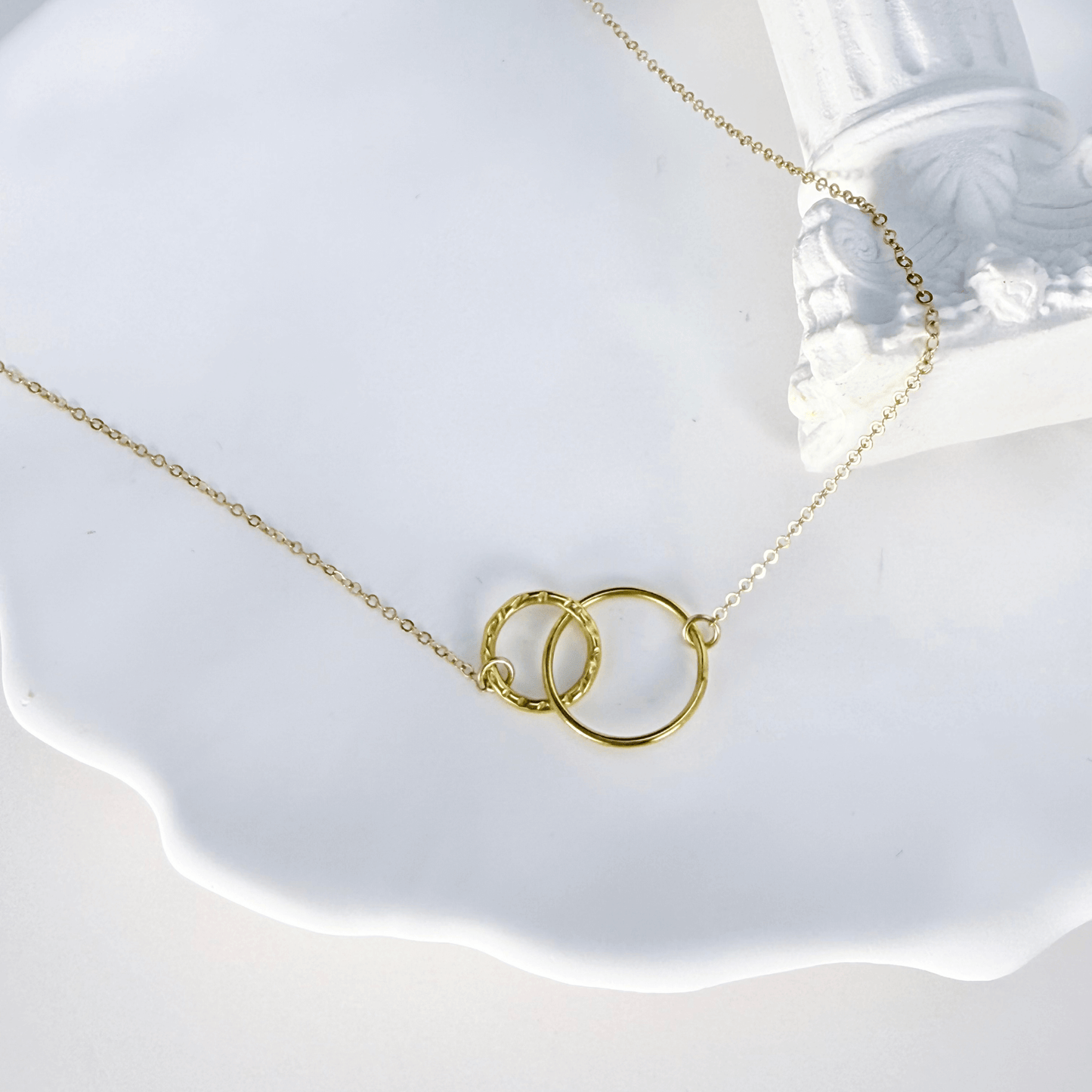 gold interlink necklace with smooth rounded links, minimalist waterproof design for everyday wear or layering