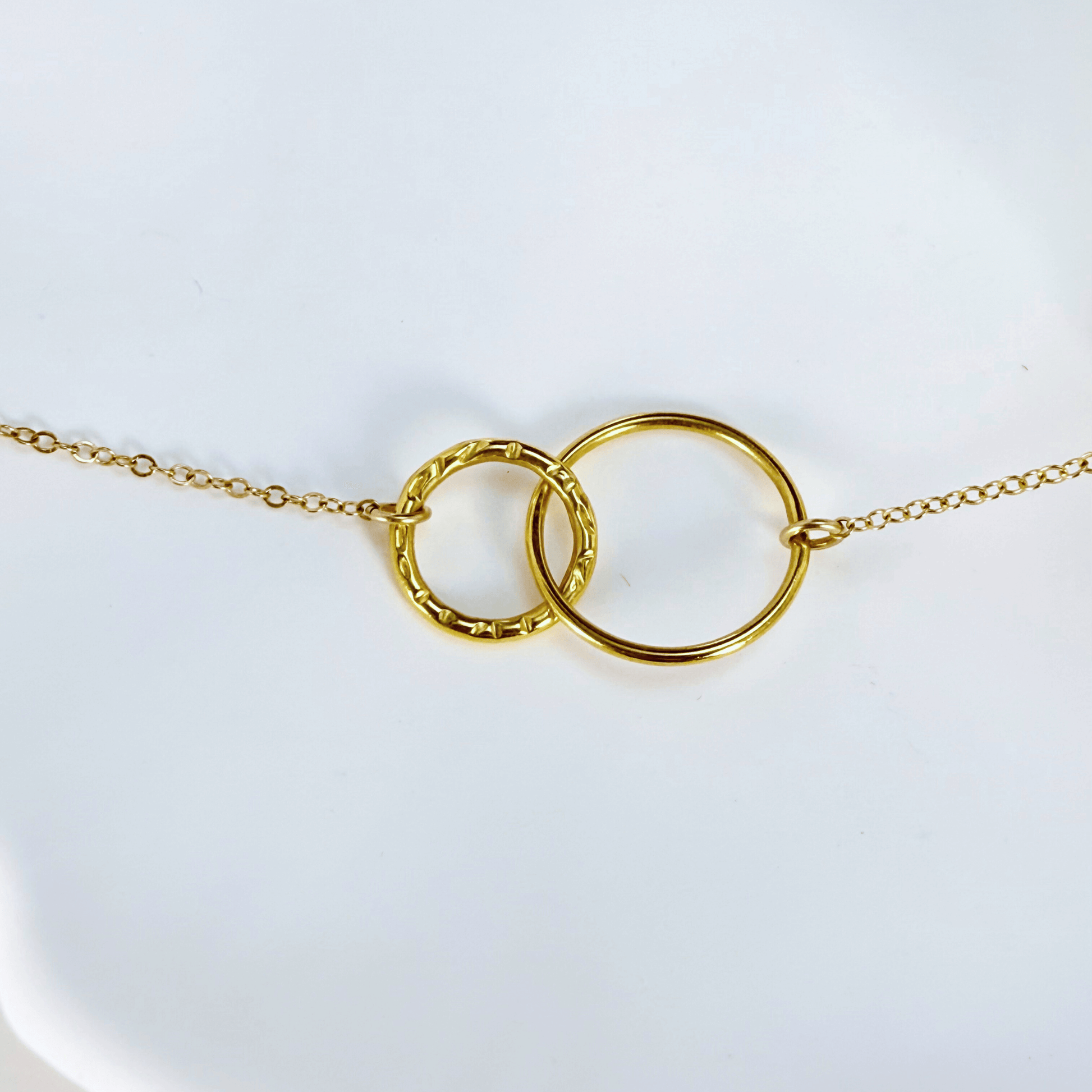 gold interlink necklace with smooth rounded links, minimalist waterproof design for everyday wear or layering