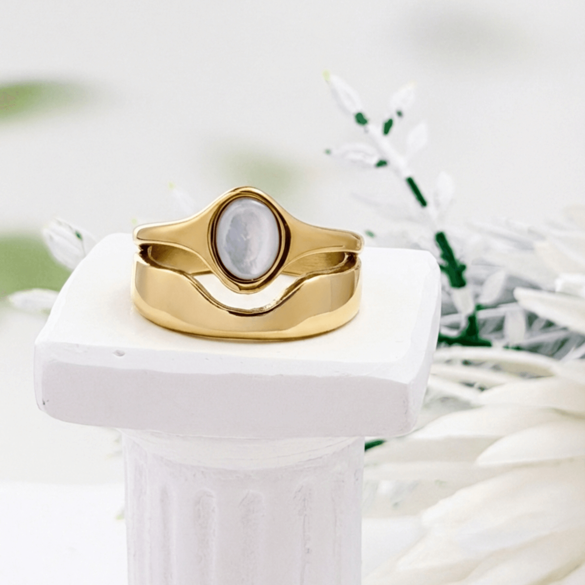 Gold Mother of Pearl Oval Signet Ring by MXW Jewellery, featuring a lustrous white stone and organic stacking design.