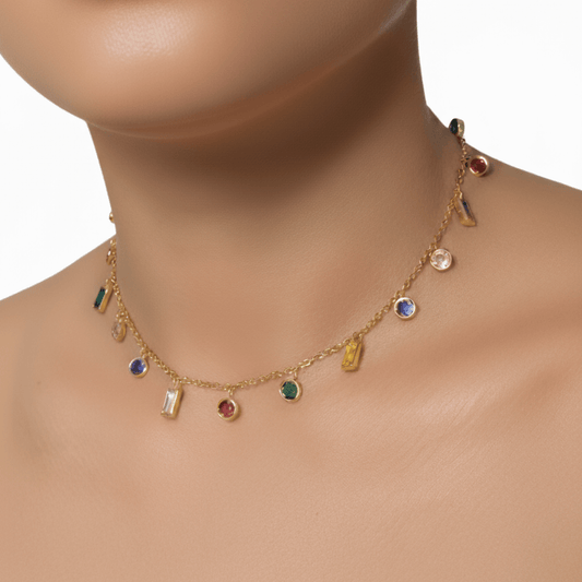 Gold multicolour zircon charm necklace with vibrant round and baguette zircon stones on a gold-plated stainless steel chain. Waterproof and hypoallergenic jewellery.