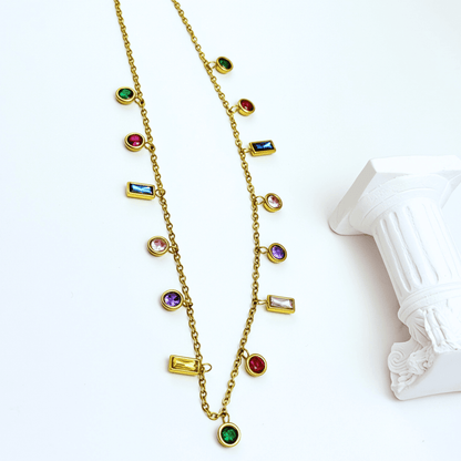 Gold multicolor zircon charm necklace with vibrant crystal accents on a waterproof gold chain.
