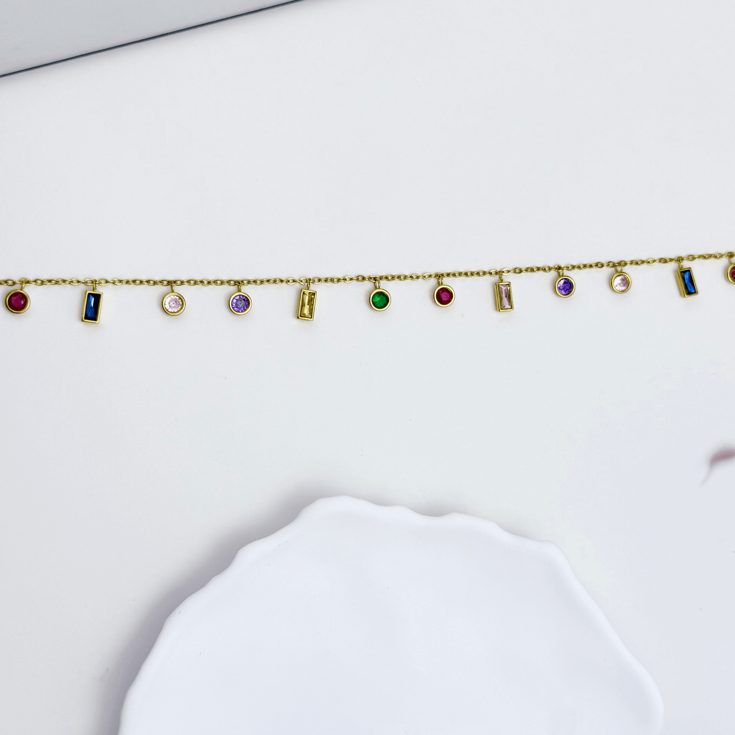 Gold multicolor zircon charm necklace with vibrant crystal accents on a waterproof gold chain.