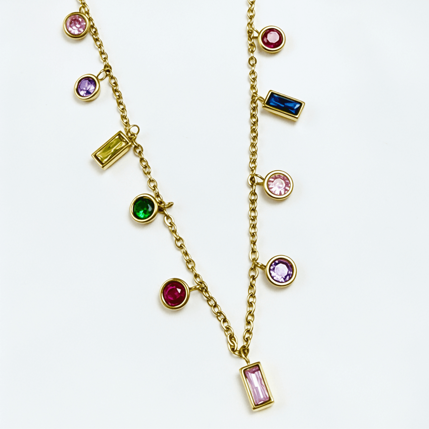 Gold multicolor zircon charm necklace with vibrant crystal accents on a waterproof gold chain.