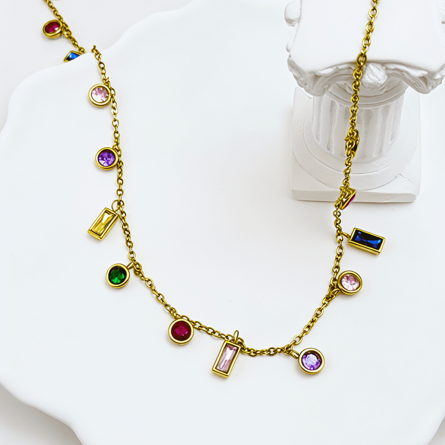 Gold multicolor zircon charm necklace with vibrant crystal accents on a waterproof gold chain.