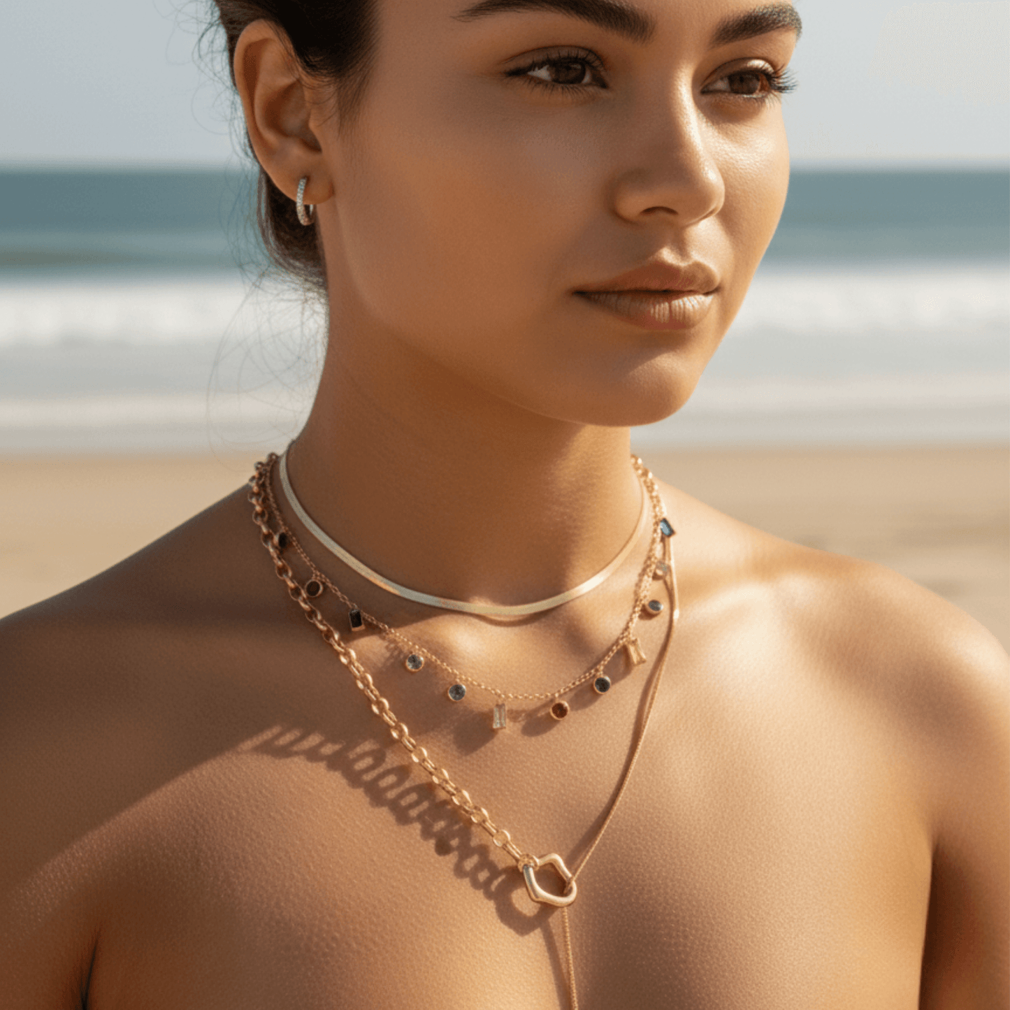 Gold multicolor zircon charm necklace with vibrant crystal accents on a waterproof gold chain.