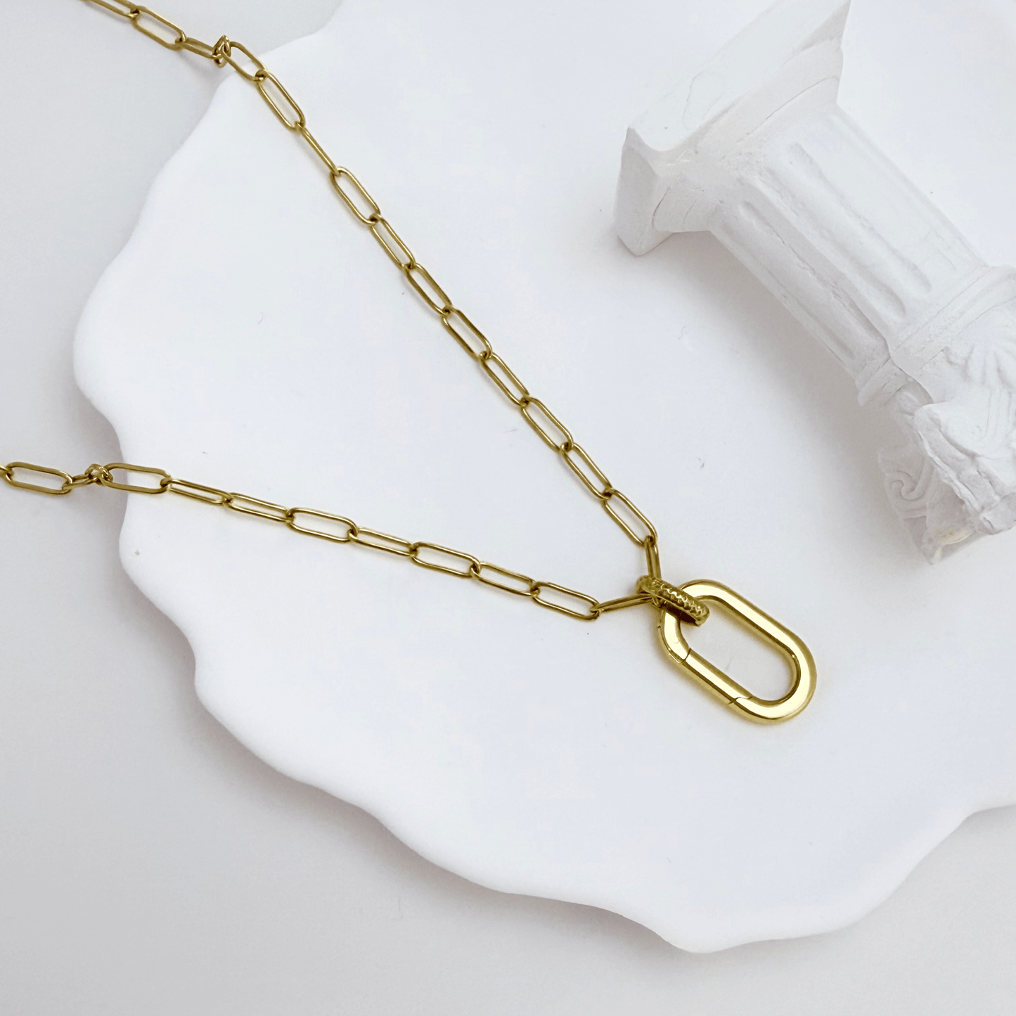Gold openable link chain necklace with oval connector clasp, designed for adding charms or pendants.