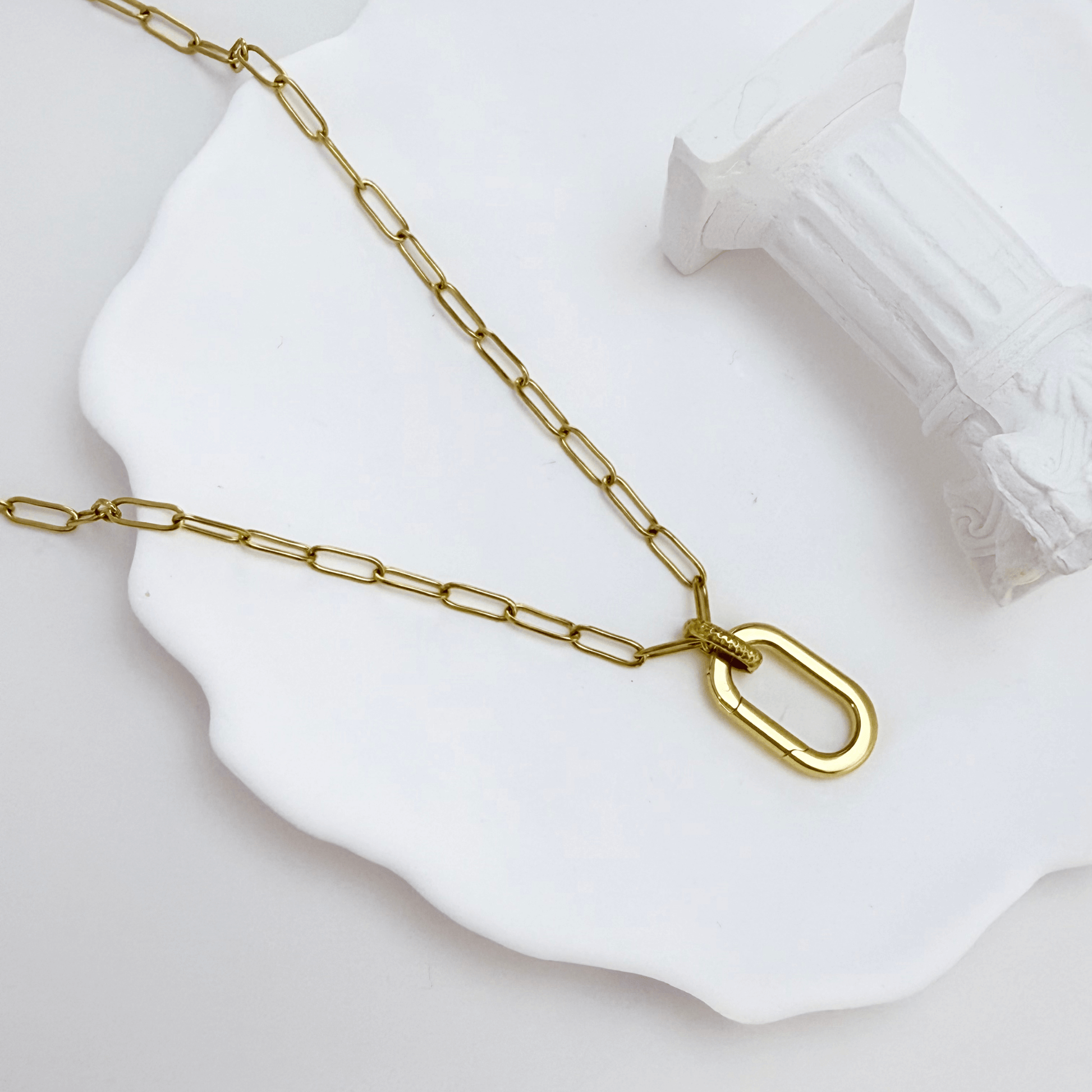 Gold openable link chain necklace with oval connector clasp, designed for adding charms or pendants.