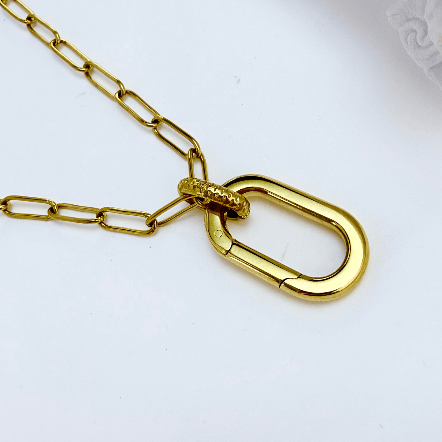 Gold openable link chain necklace with oval connector clasp, designed for adding charms or pendants.