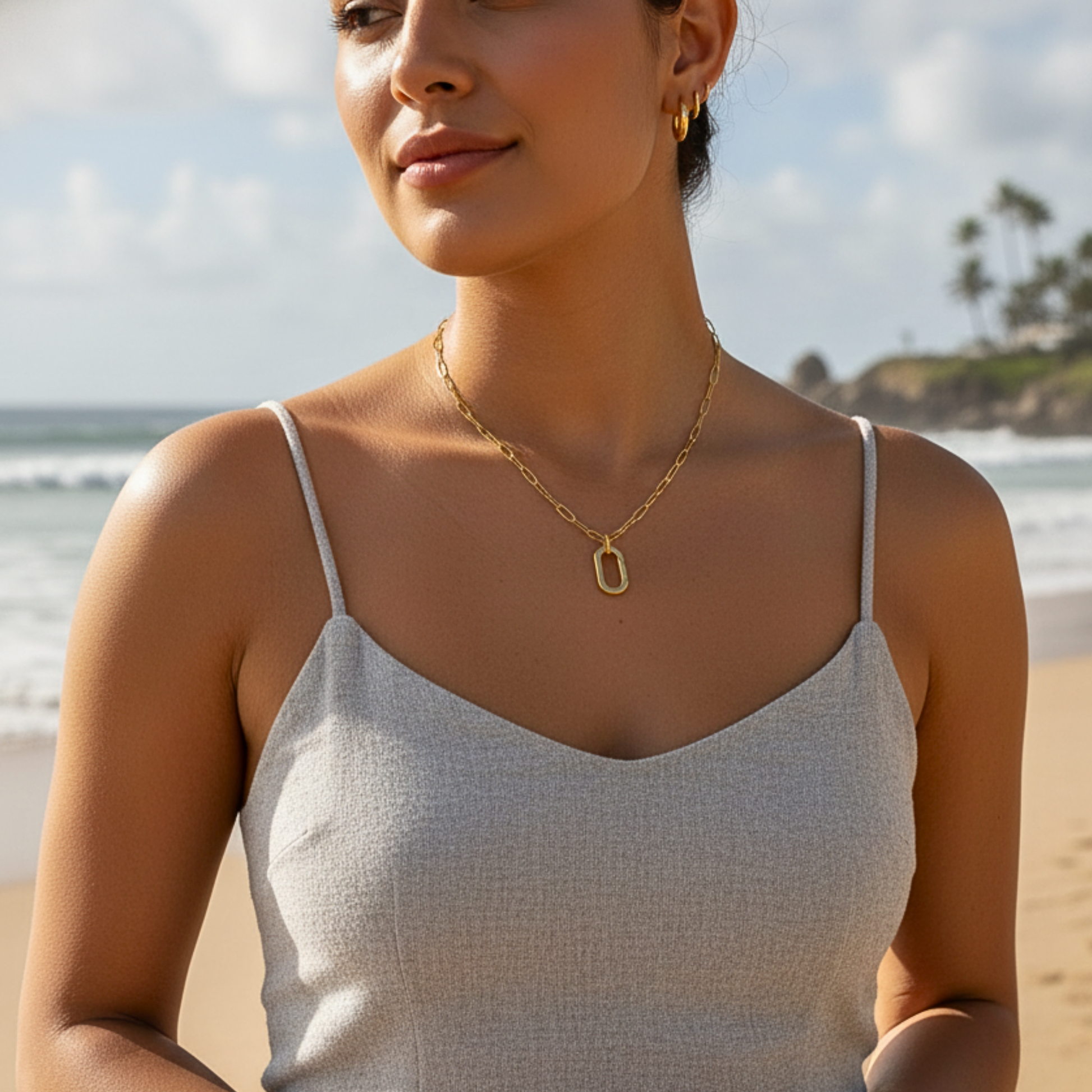 Gold openable link chain necklace with oval connector clasp, designed for adding charms or pendants.