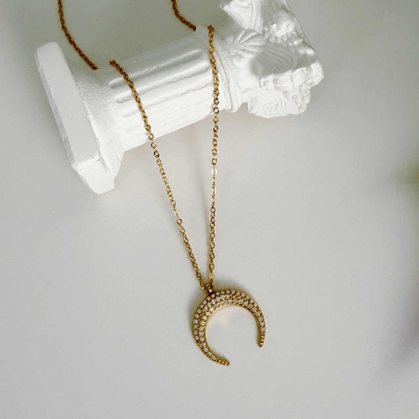 Gold pavé crescent moon necklace with sparkling crystals - MXW Jewellery