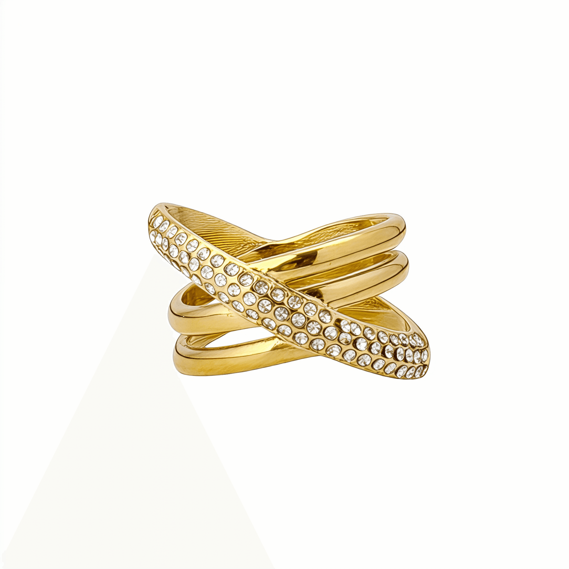Gold Pave Crossover Ring by MXW Jewellery featuring intertwined gold bands and sparkling crystal pave details.