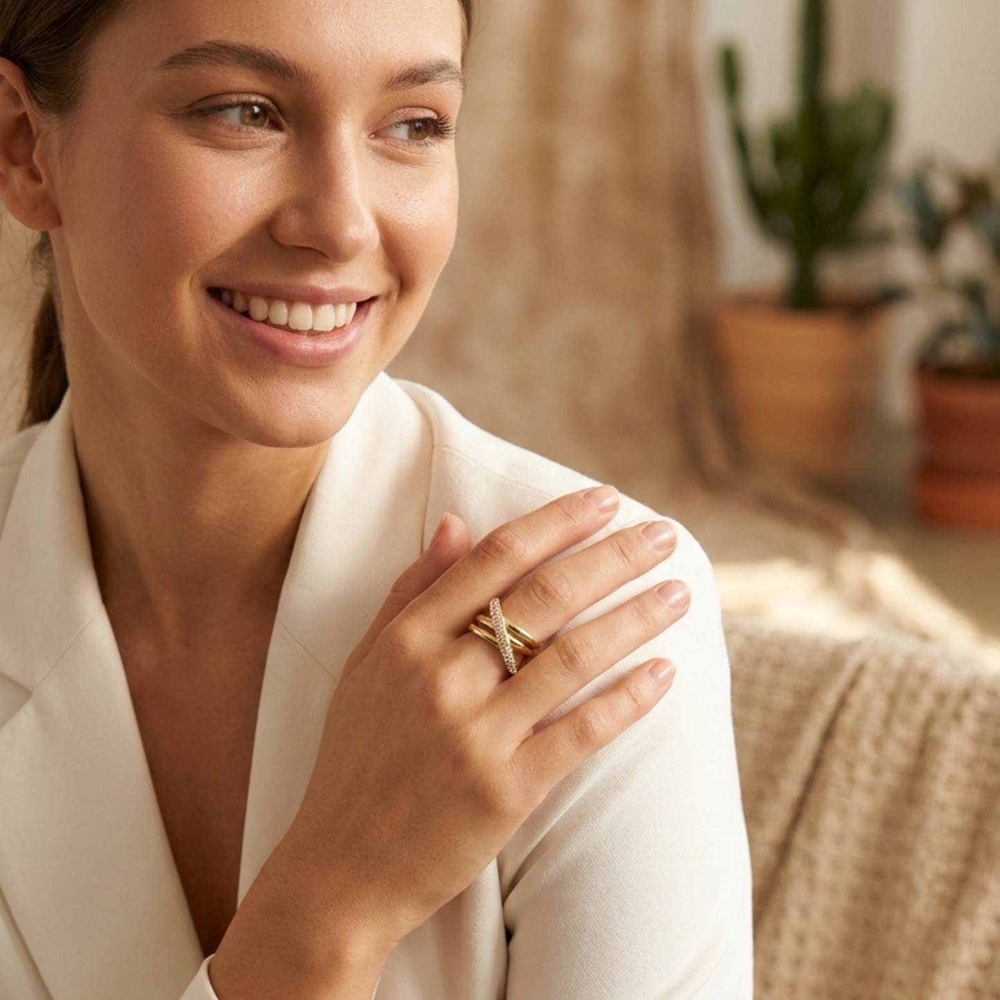 Gold Pave Crossover Ring by MXW Jewellery featuring intertwined gold bands and sparkling crystal pave details.