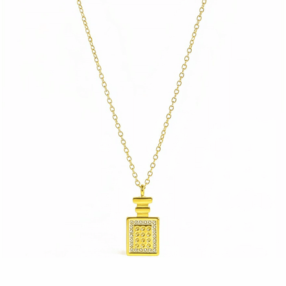 Gold perfume bottle pendant necklace with crystal detailing, symbolising elegance and charm.