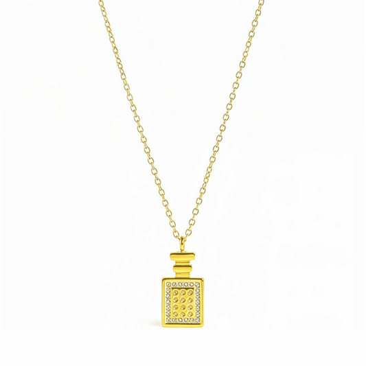 Gold perfume bottle pendant necklace with crystal detailing, symbolising elegance and charm.