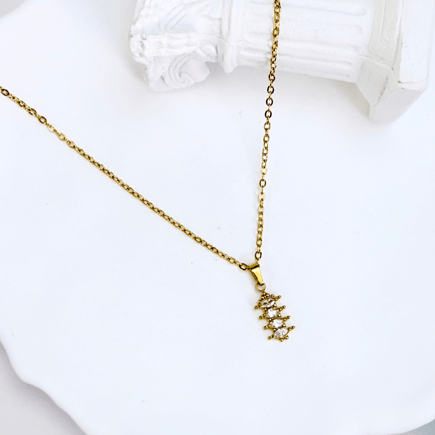 gold quad marquise crystal necklace with four clear navette stones on fine gold chain