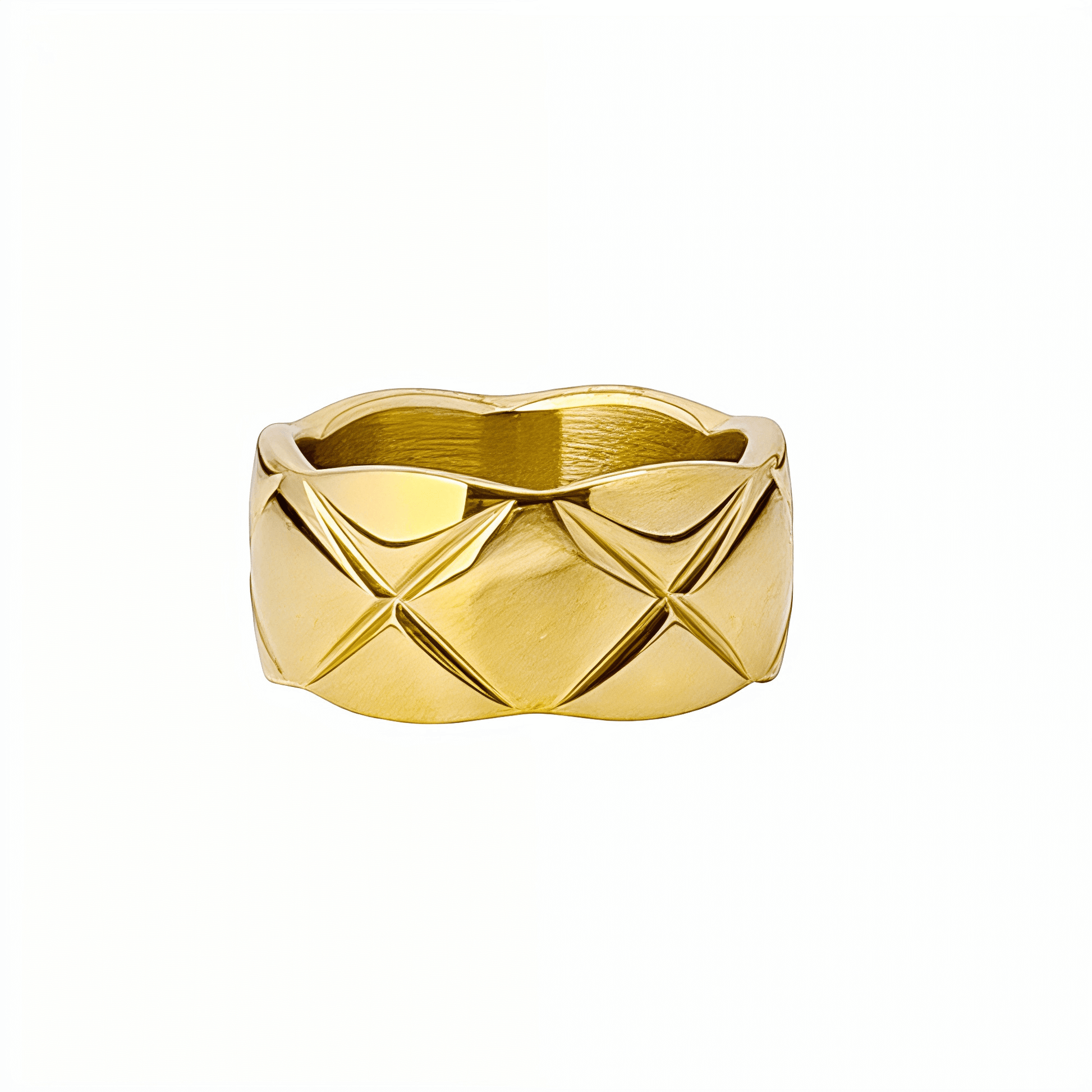 Quilted Gold Band Ring by MXW Jewellery, featuring a wide gold band with a geometric cross-hatch pattern on a white pedestal.