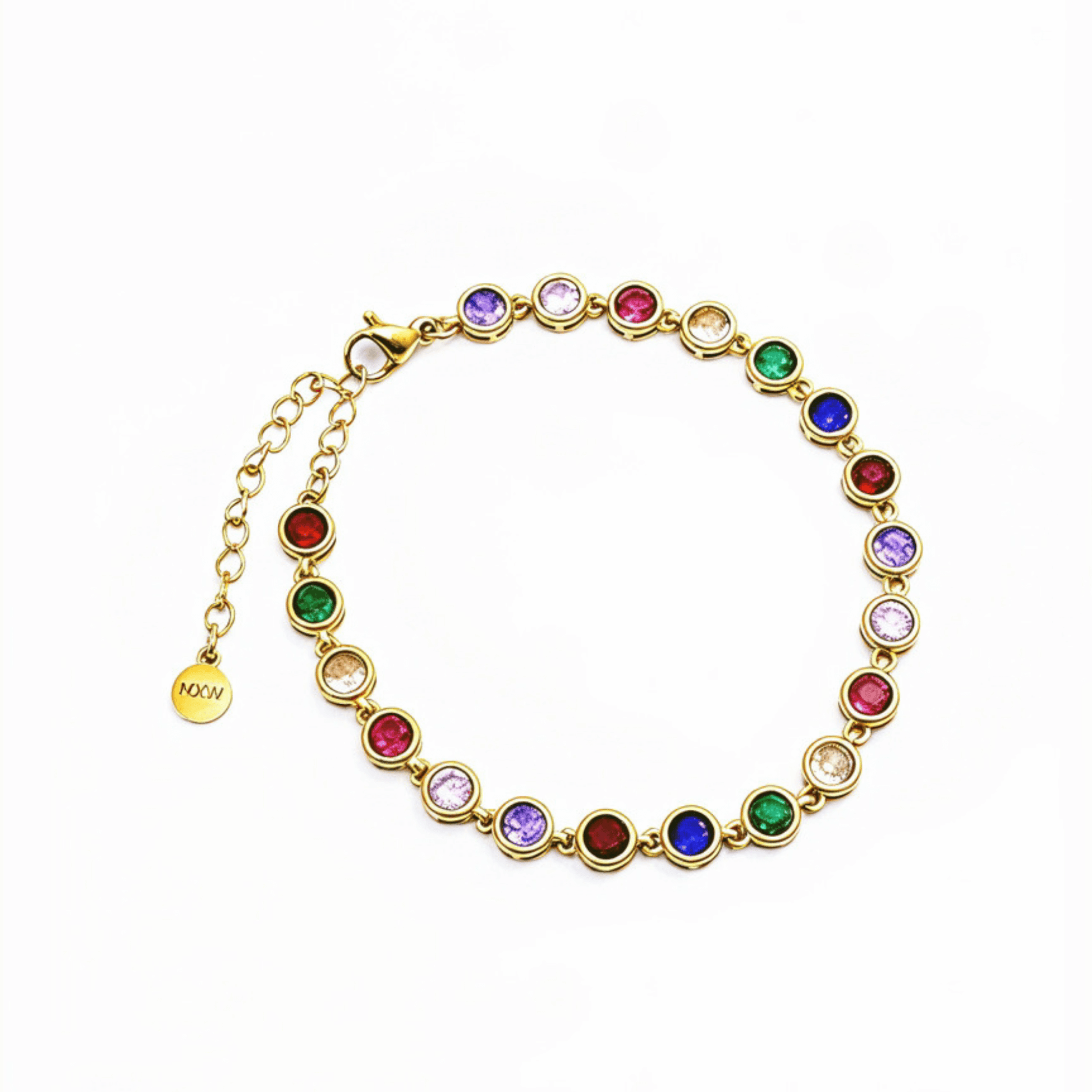 Gold rainbow crystal tennis bracelet with multi-coloured bezel-set stones.
