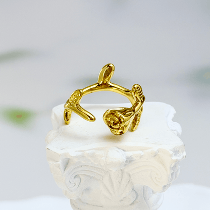 Gold rosebud vine ring with sculpted floral and leaf details, adjustable waterproof gold ring by MXW Jewellery.