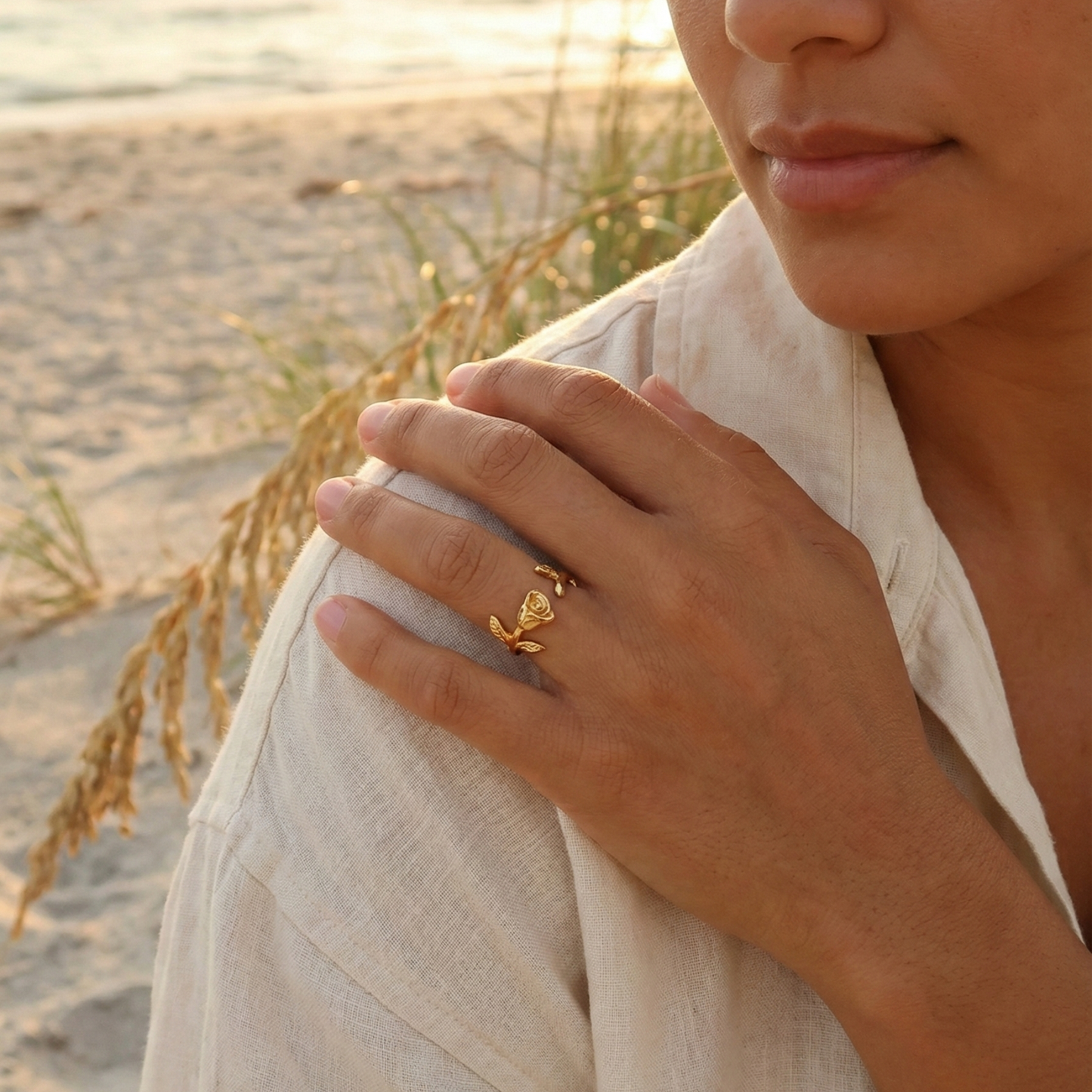 Gold rosebud vine ring with sculpted floral and leaf details, adjustable waterproof gold ring by MXW Jewellery.