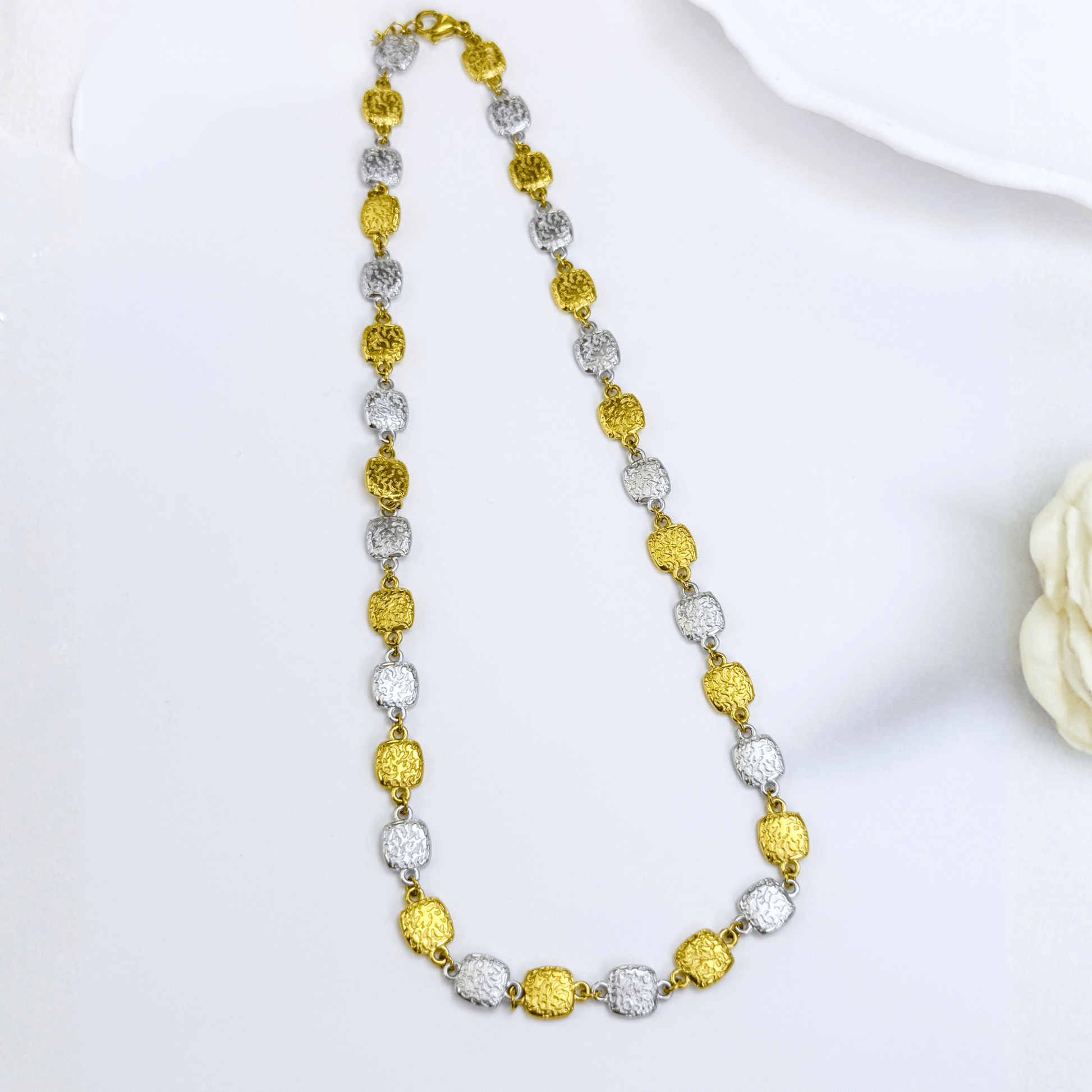 Gold and silver textured square link chain necklace featuring alternating two-tone engraved links with a classic, polished finish.
