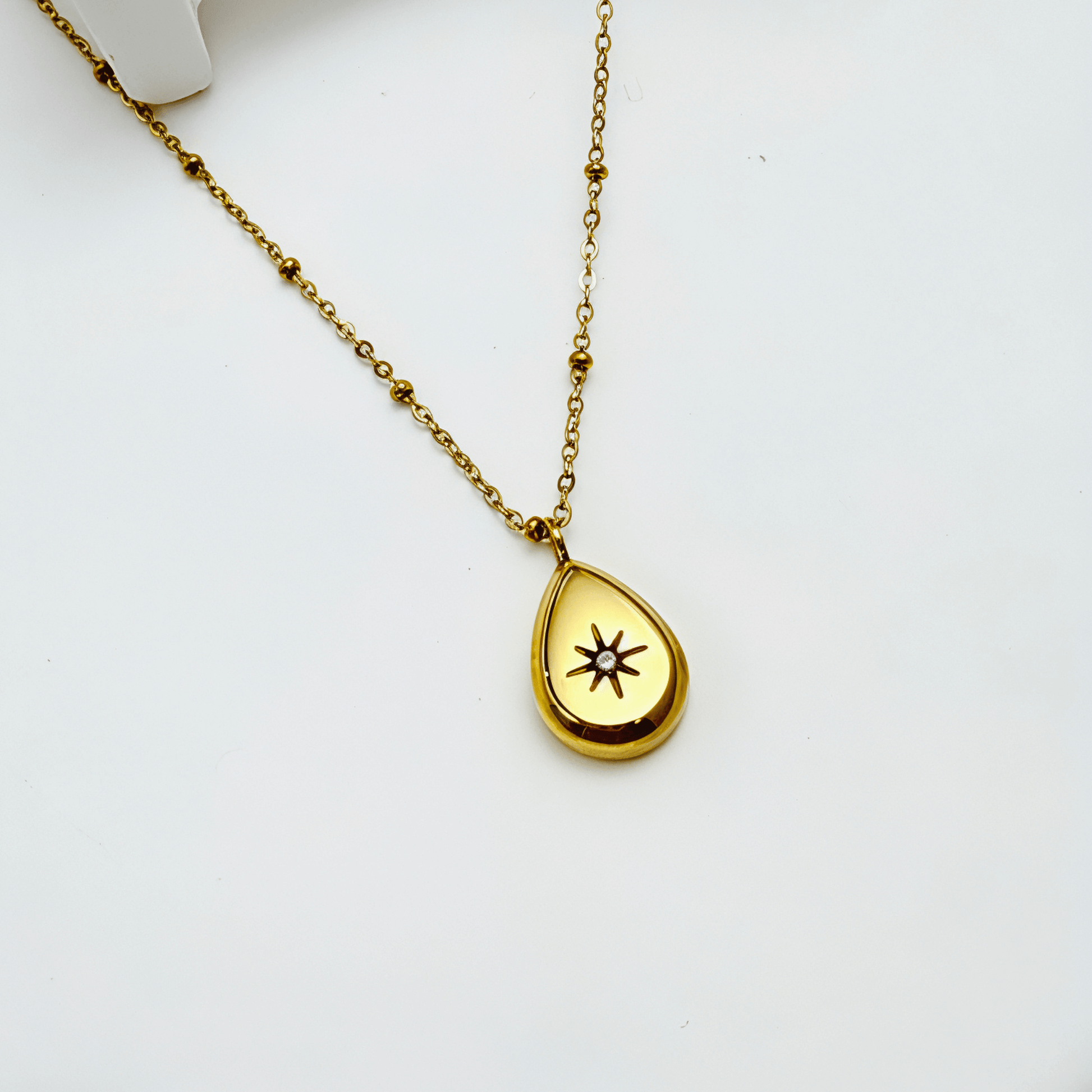 Gold Starburst Teardrop Necklace – MXW Jewellery