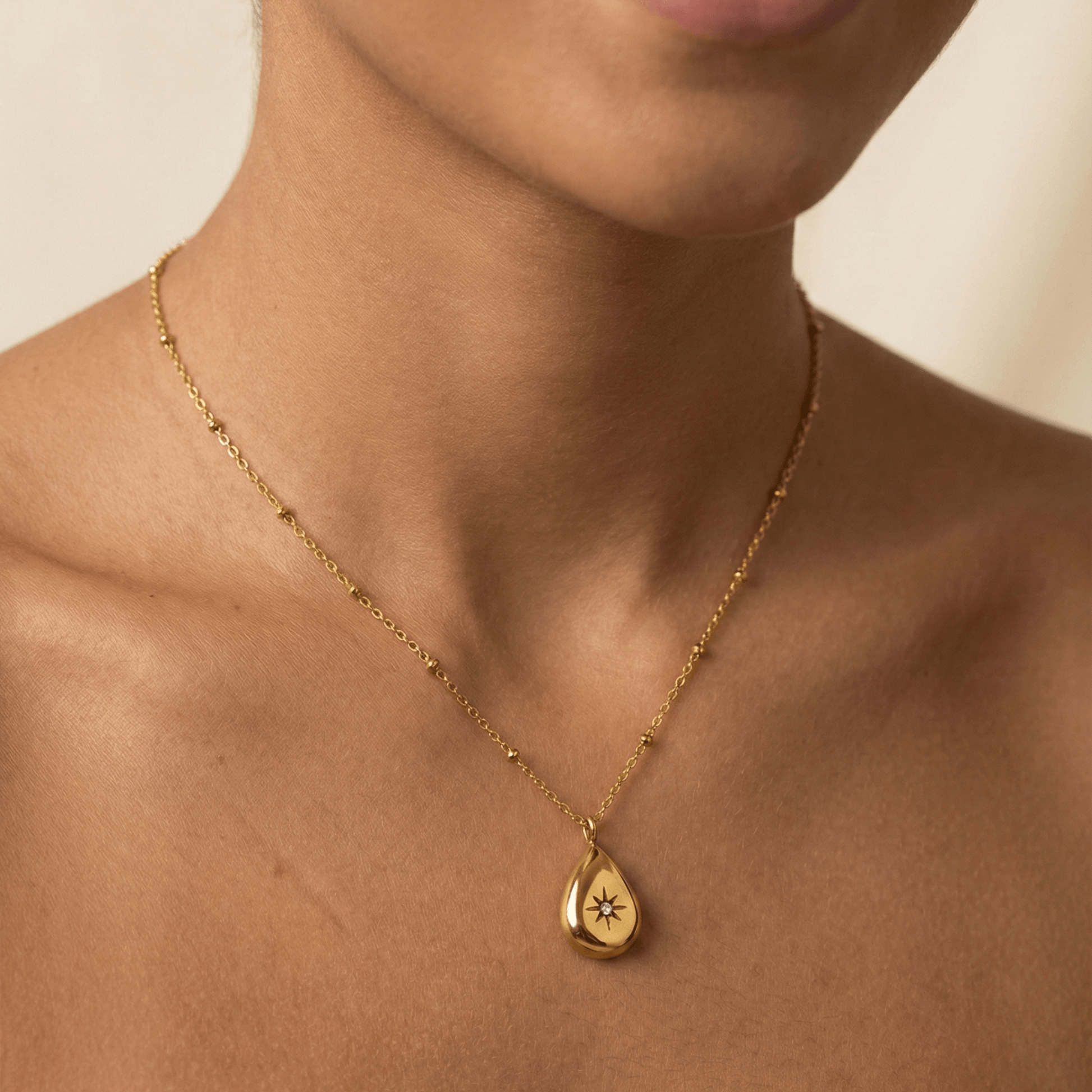 Gold Starburst Teardrop Necklace – MXW Jewellery