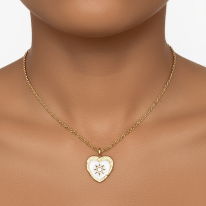 Gold sunburst heart zircon necklace with white enamel, waterproof and tarnish-resistant, perfect for everyday wear.