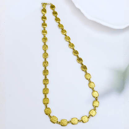 Gold textured square link chain necklace featuring small engraved square links connected in a continuous gold pattern.