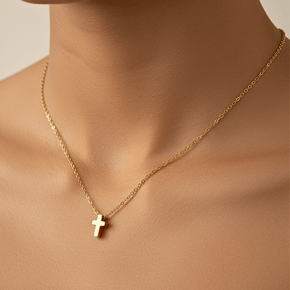 Gold tiny cross necklace symbolising faith and grace – MXW Jewellery