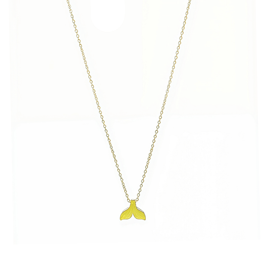 Gold necklace with a gold mermaid tail pendant on a white background