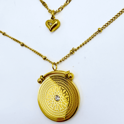 Gold double-layer necklace with heart charm and mandala pendant