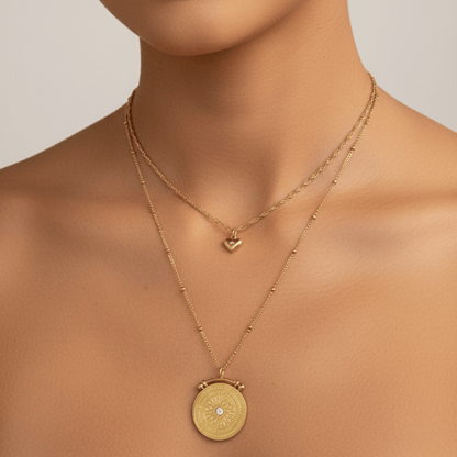 Gold double-layer necklace with heart charm and mandala pendant
