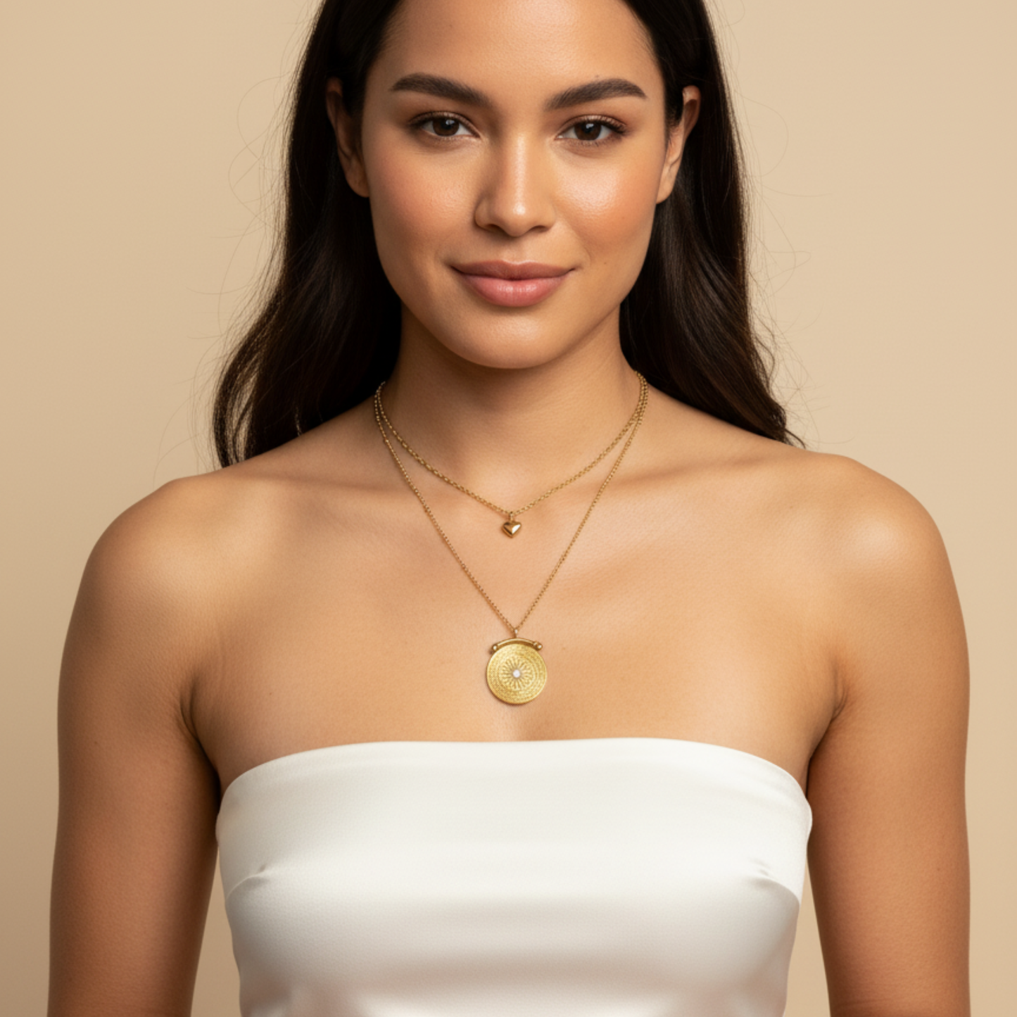 Gold double-layer necklace with heart charm and mandala pendant