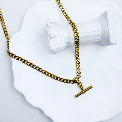 gold t-bar curb chain necklace with polished bar pendant